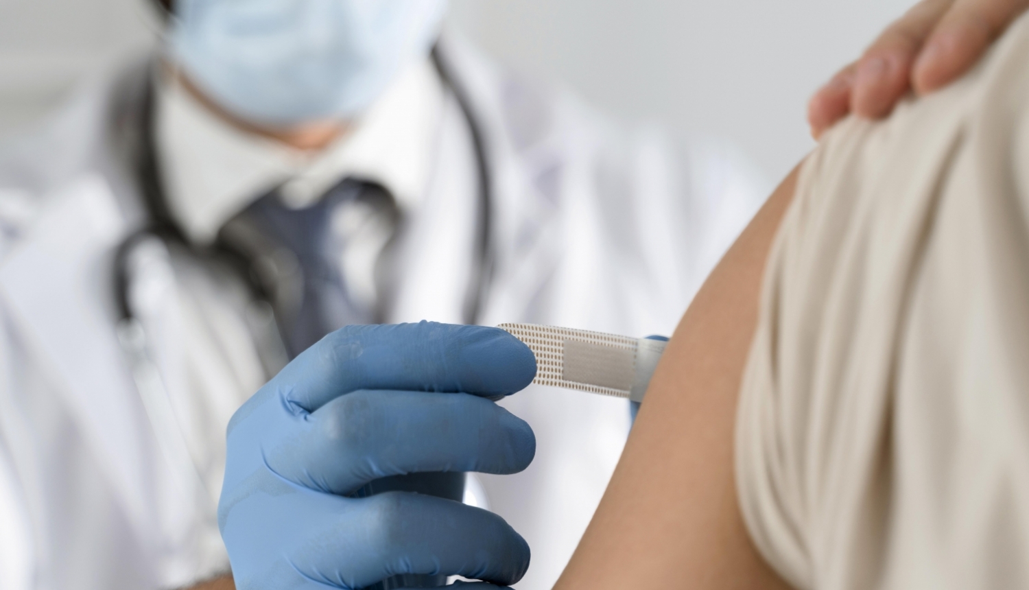 Man Putting Bandage Young Woman S Arm 1