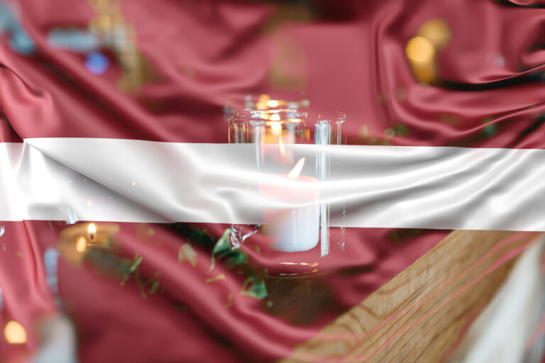 Several Candles Stand On Wooden Shelf