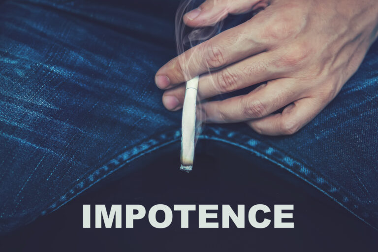 Sexual,dysfunction,concept.,the,guy,holds,a,cigarette,in,the
